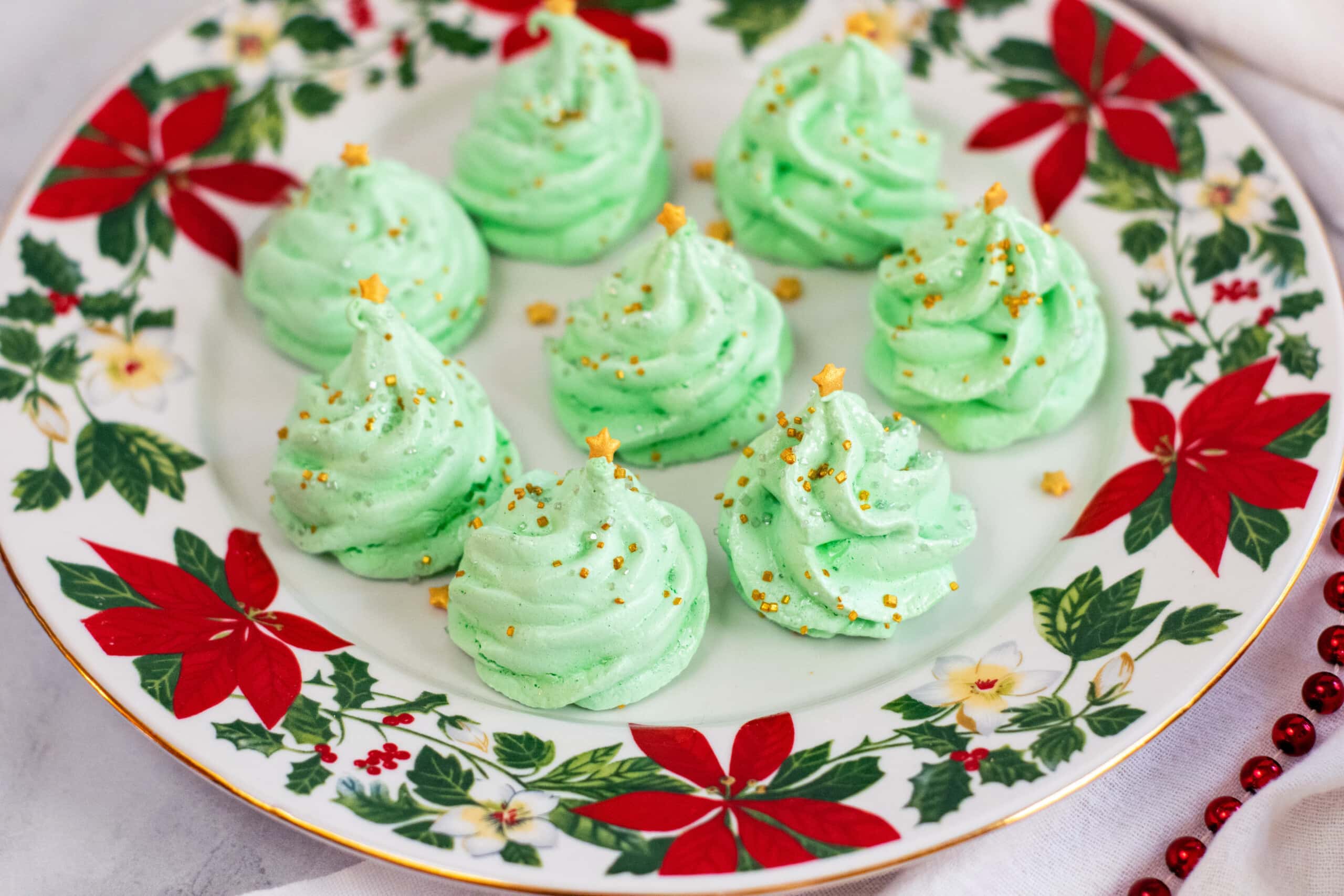 Christmas meringues on holiday plate