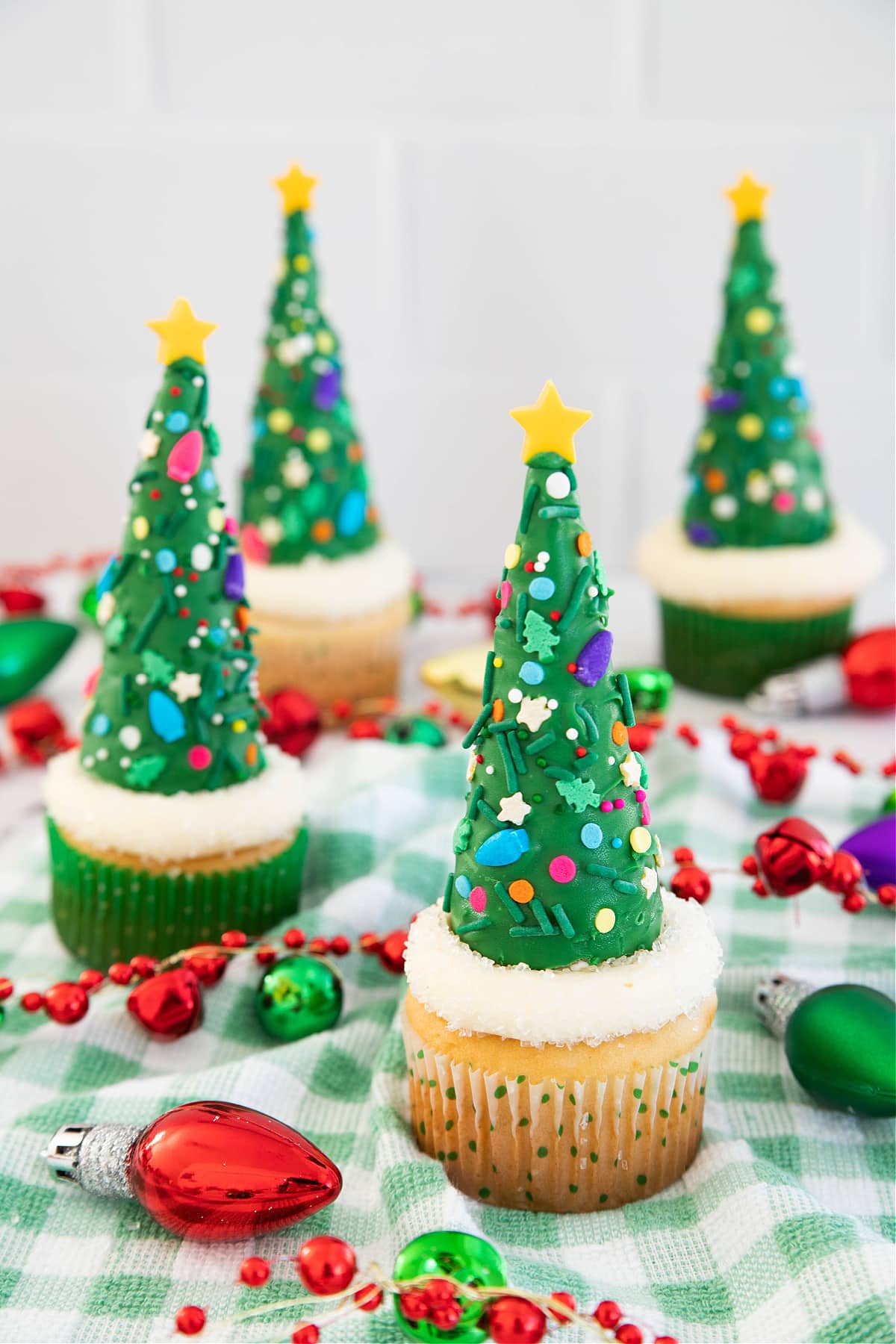 Christmas tree cupcakes with holiday decorations