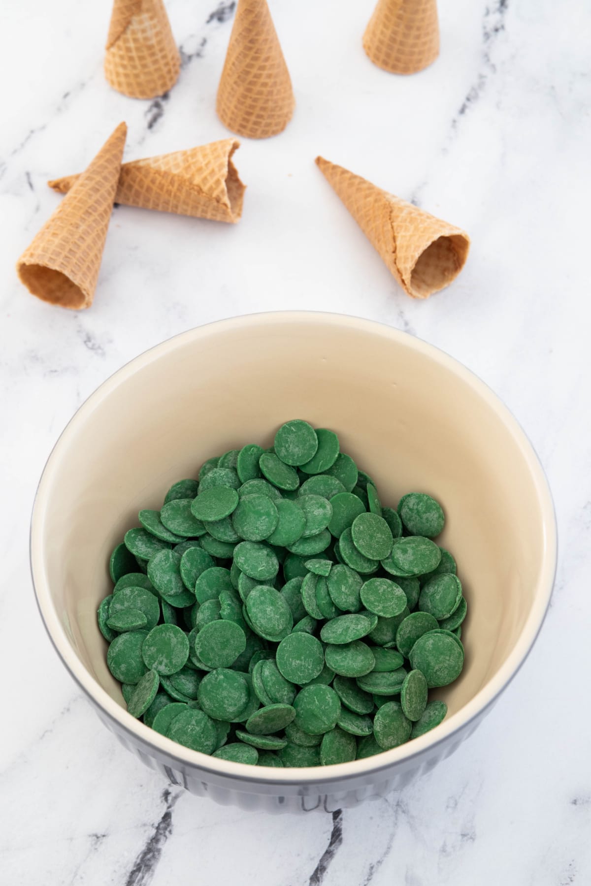 Green candy melts in bowl