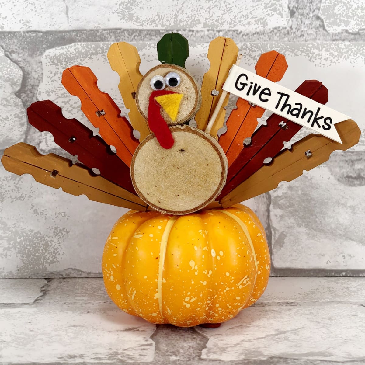 Clothespin turkey on pumpkin