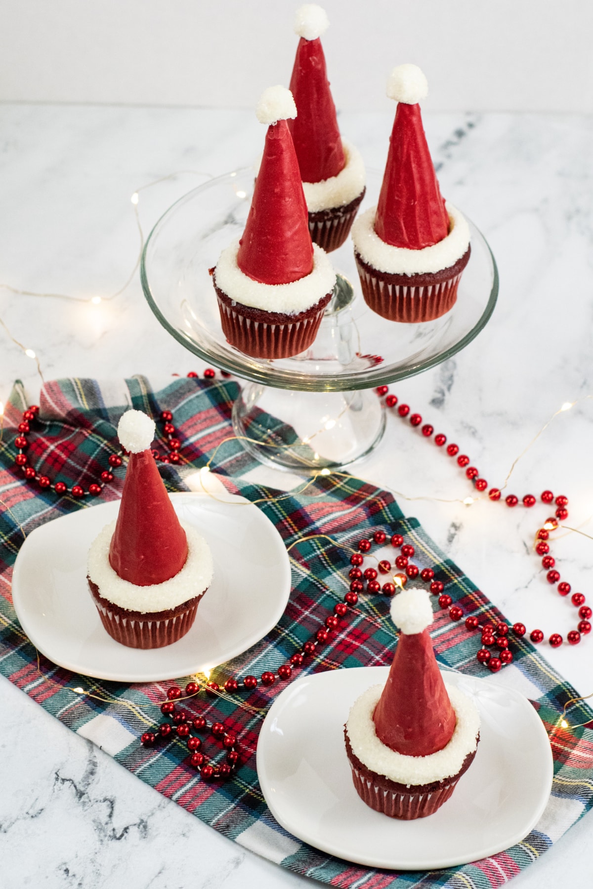 Santa hat cupcakes with plaid napkin