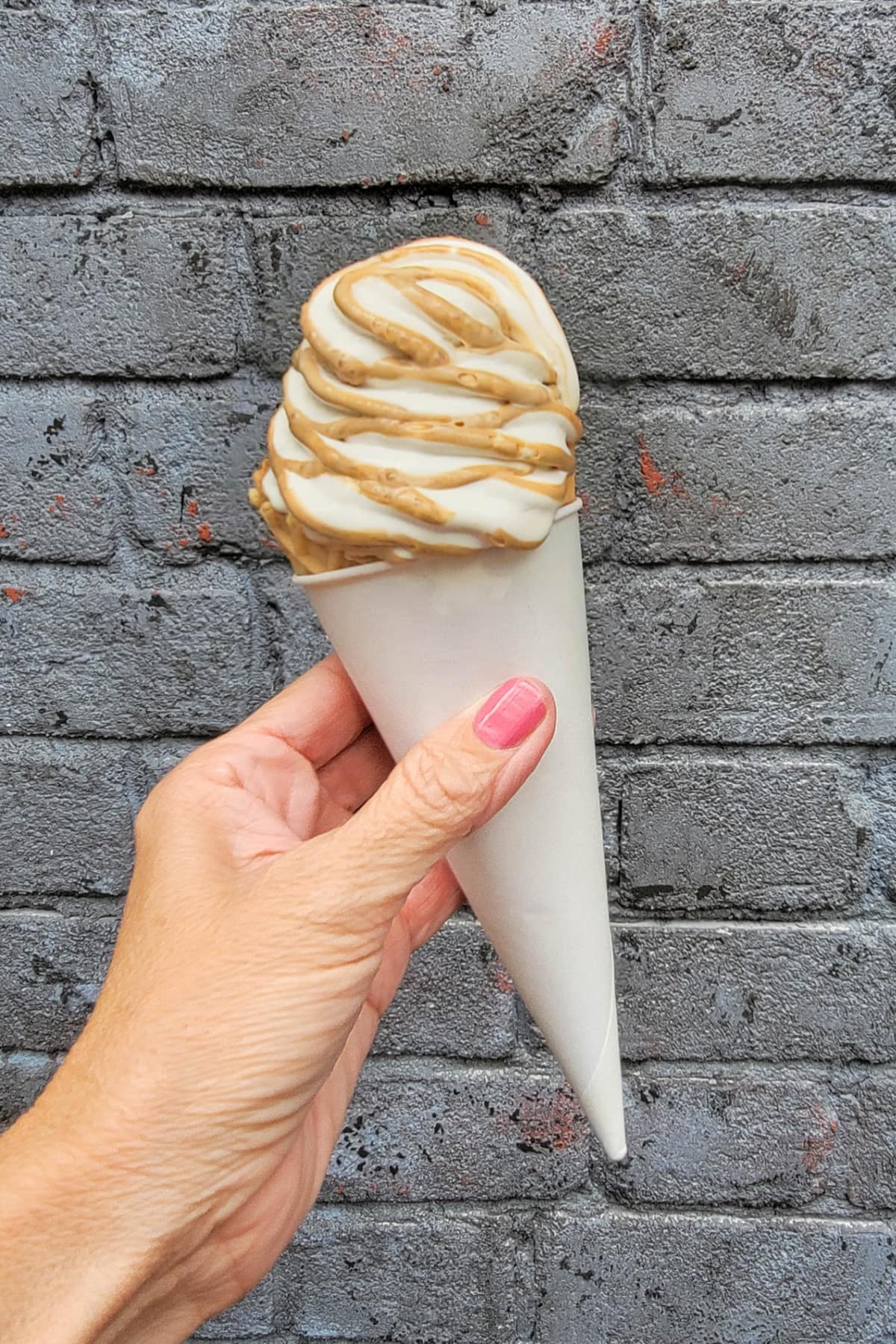 Butterbeer Ice Cream in waffle cone