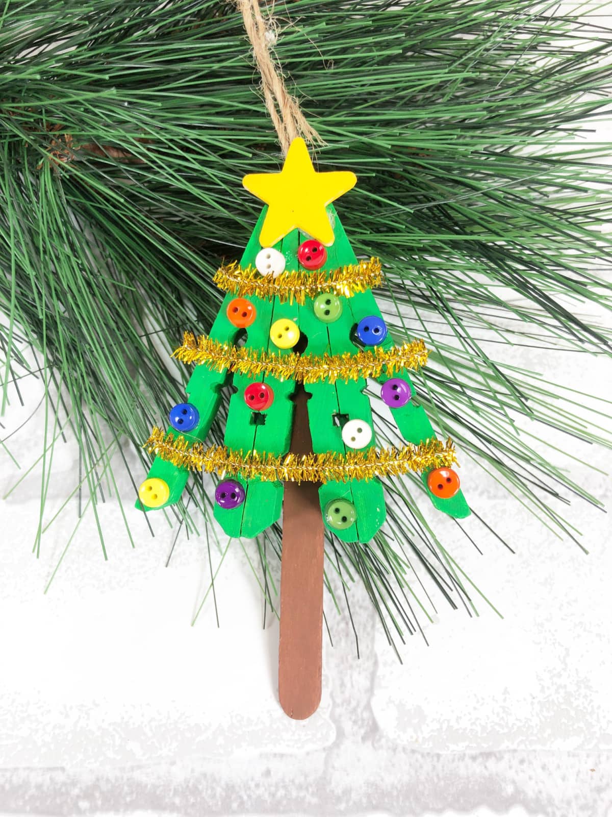 Clothespin Christmas tree on white background