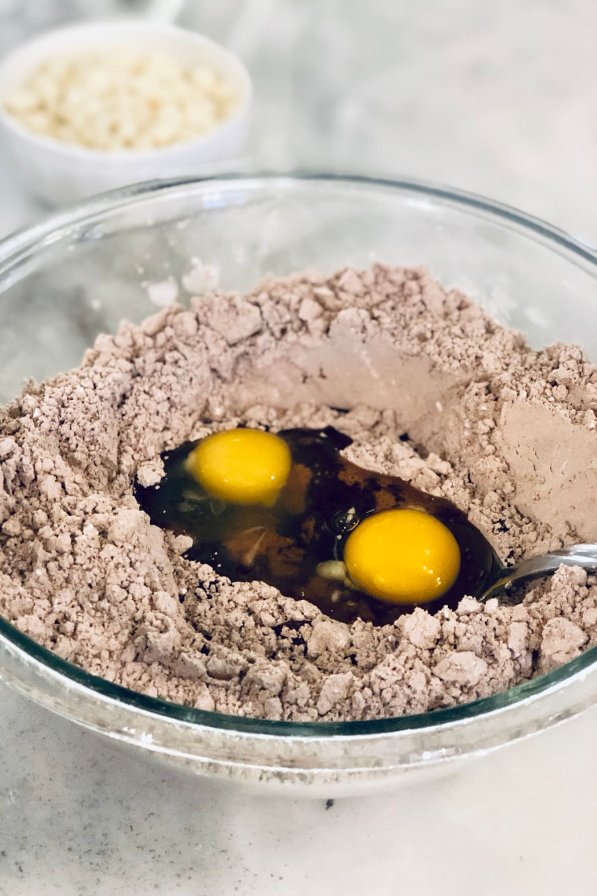 Eggs mixed with brownie mix, vegetable oil and flour
