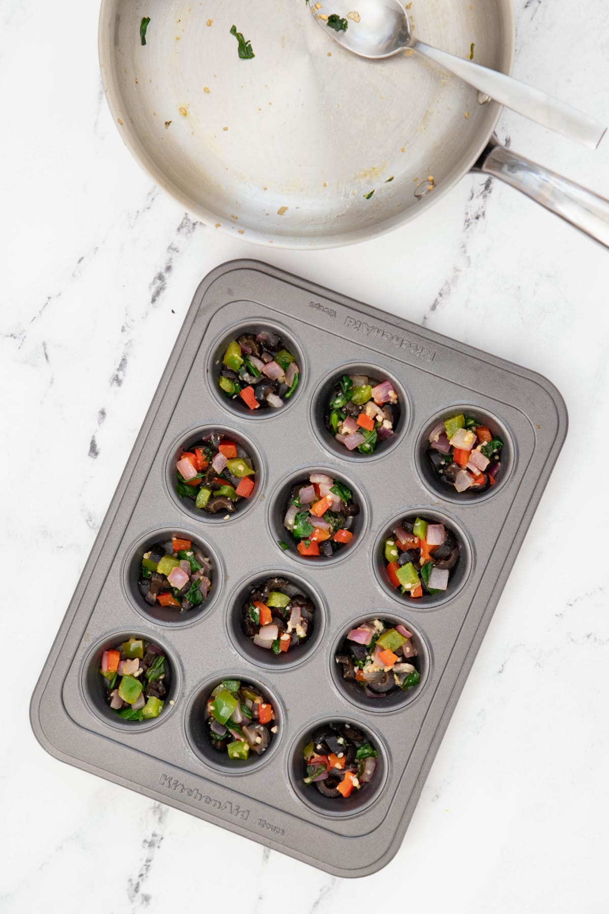 Sauteed vegetables in mini muffin pan