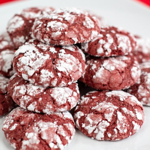 Red velvet crinkle cookies on white plate