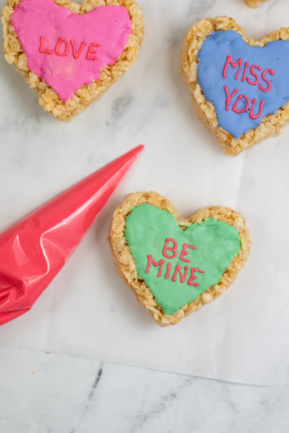Heart shaped rice krispie treats with text