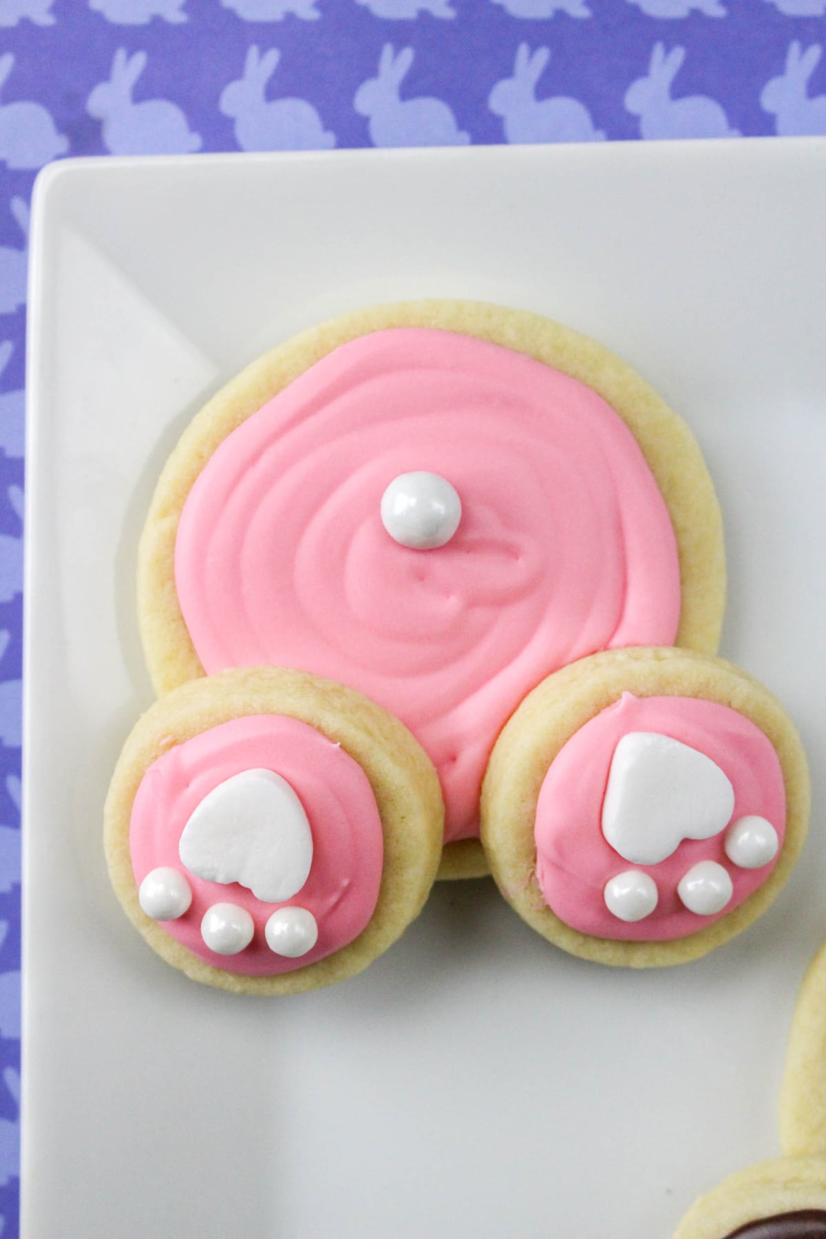 Pink bunny butt cookie on plate