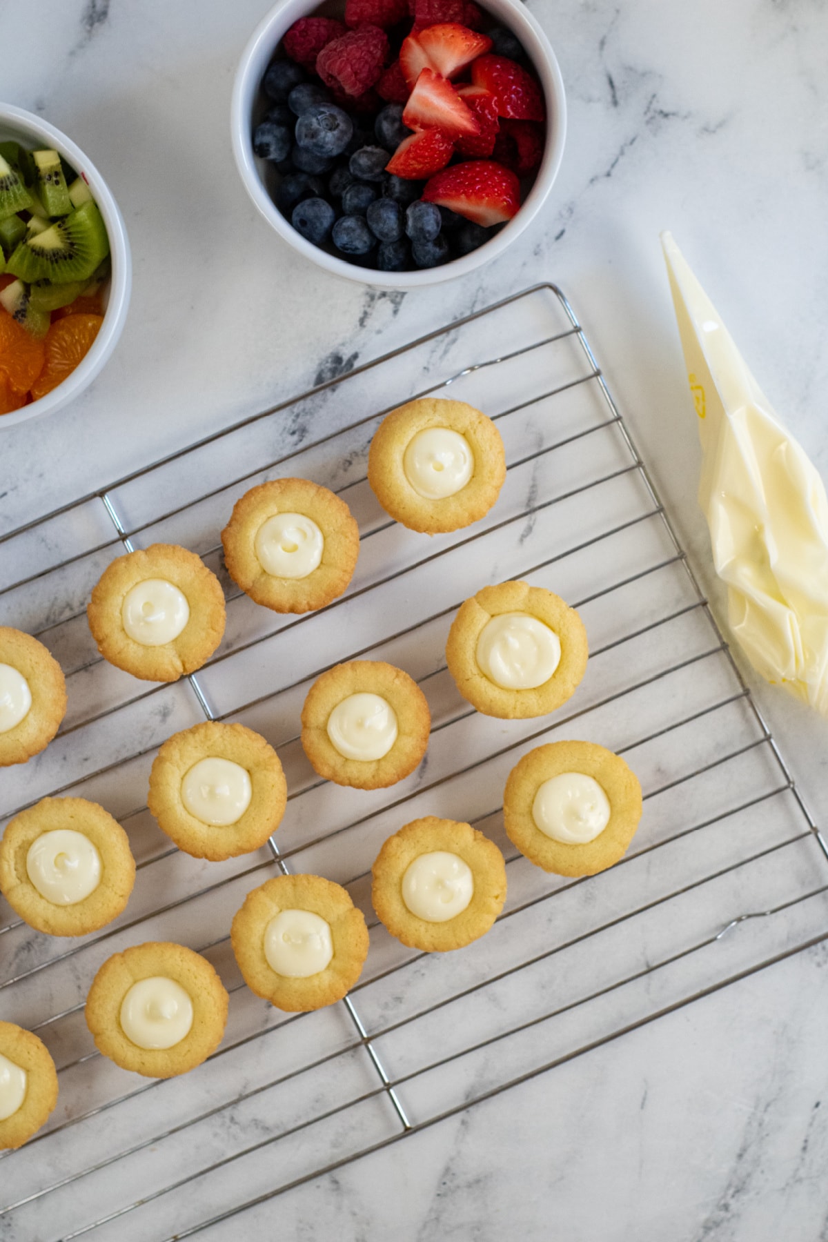 Mini sugar cookie cups filled with icing