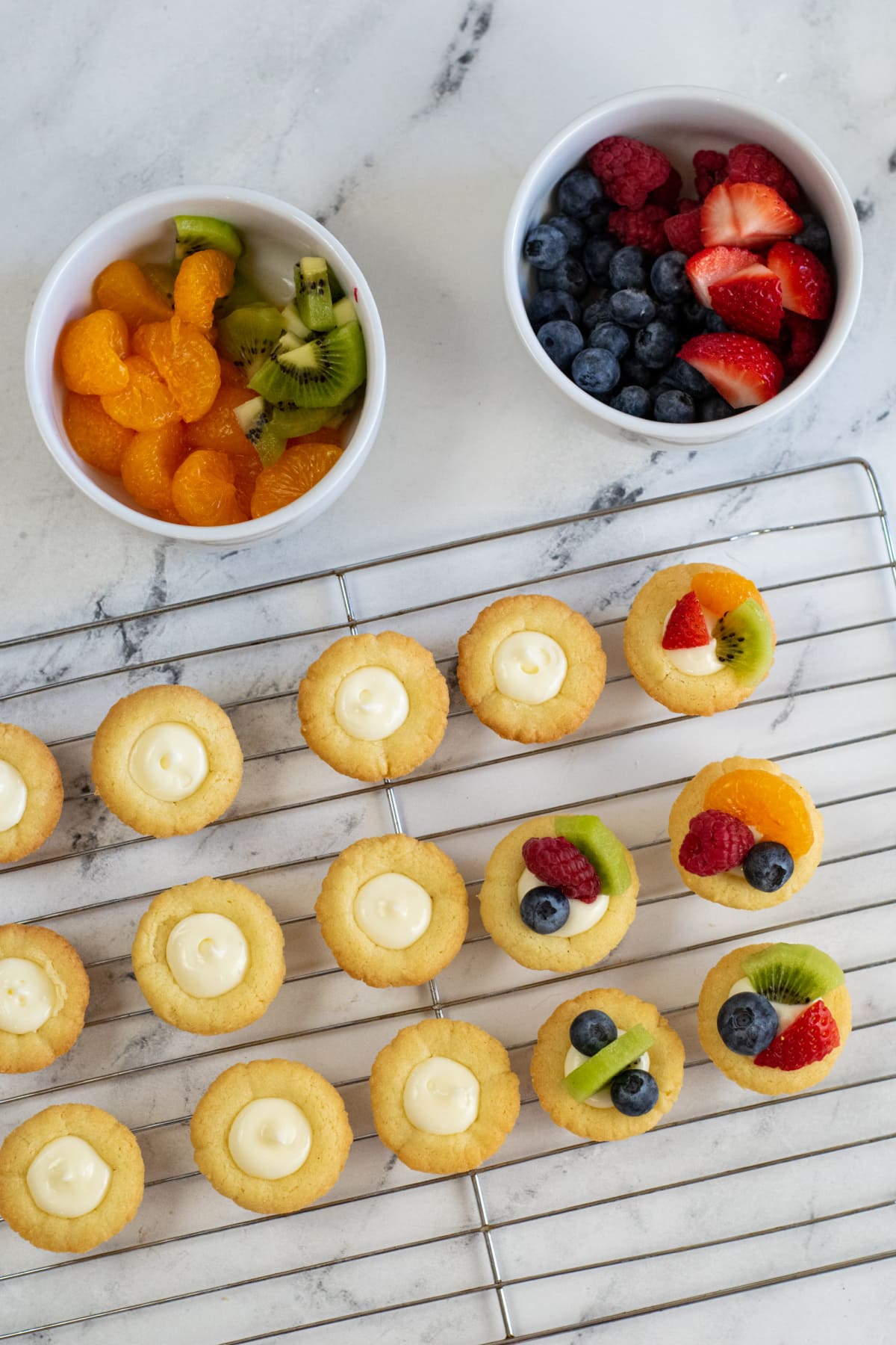Sugar cookie cups filled with icing and fruit