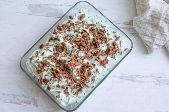 Mint chocolate chip ice cream in glass pan