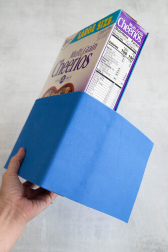 Blue craft foam wrapped around cereal box