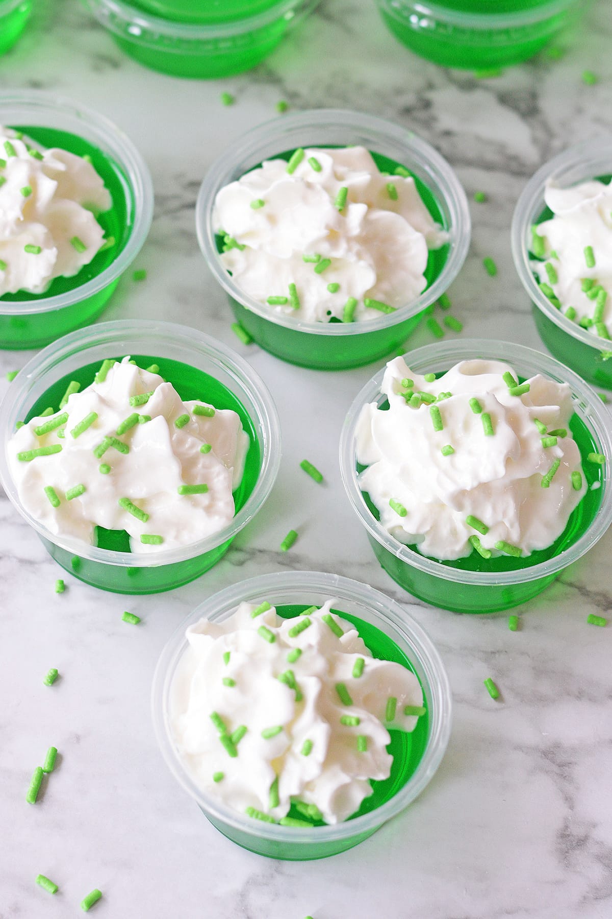 St. Patrick's Jello Shots with whipped cream