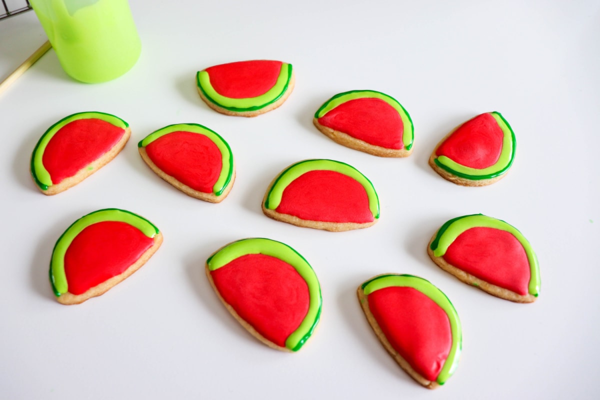 Green and red icing on sugar cookies