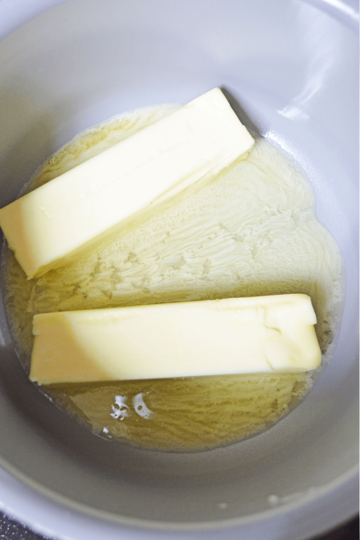 Butter in bowl slightly melted