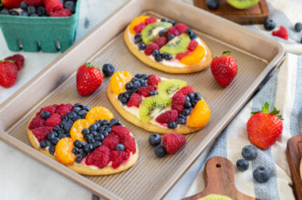 Three pieces of Easter egg fruit pizza