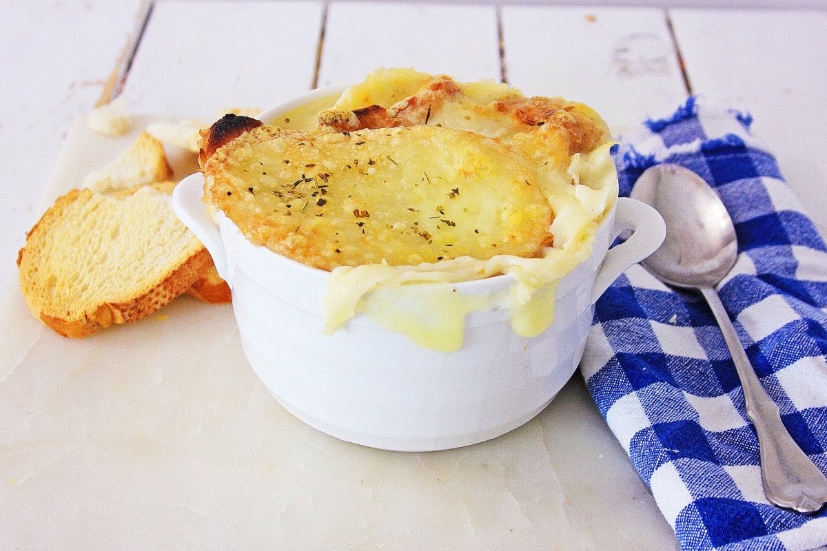 French onion soup with blue and white napking