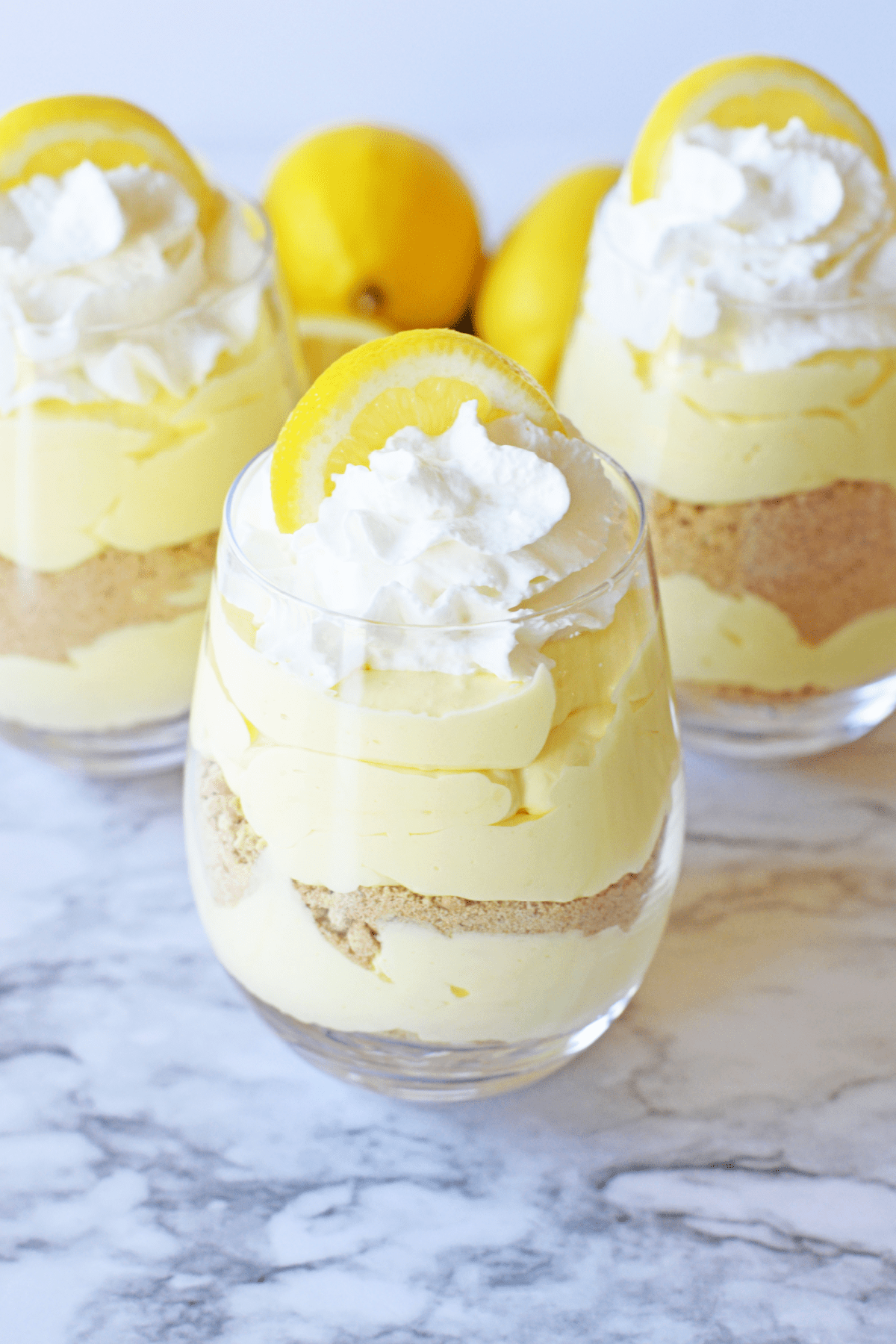 Three lemon cheesecake parfait desserts