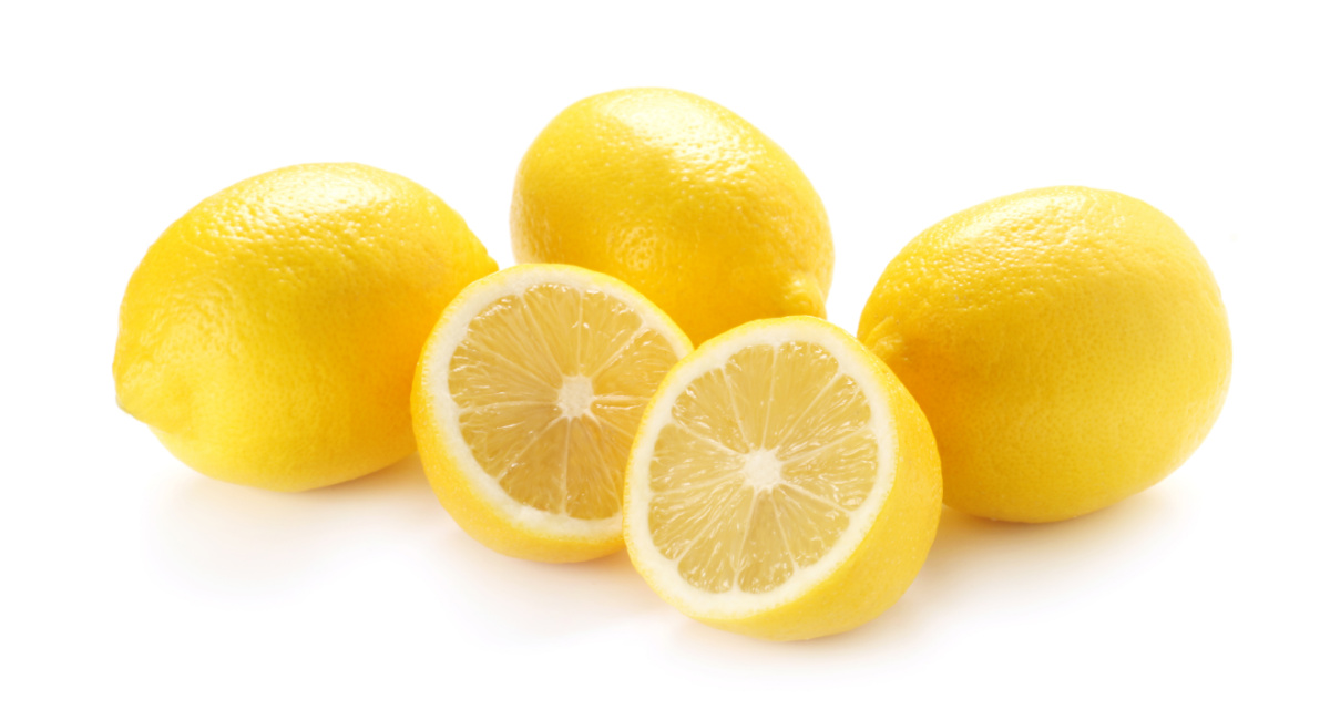 A bunch of lemons on a white background.