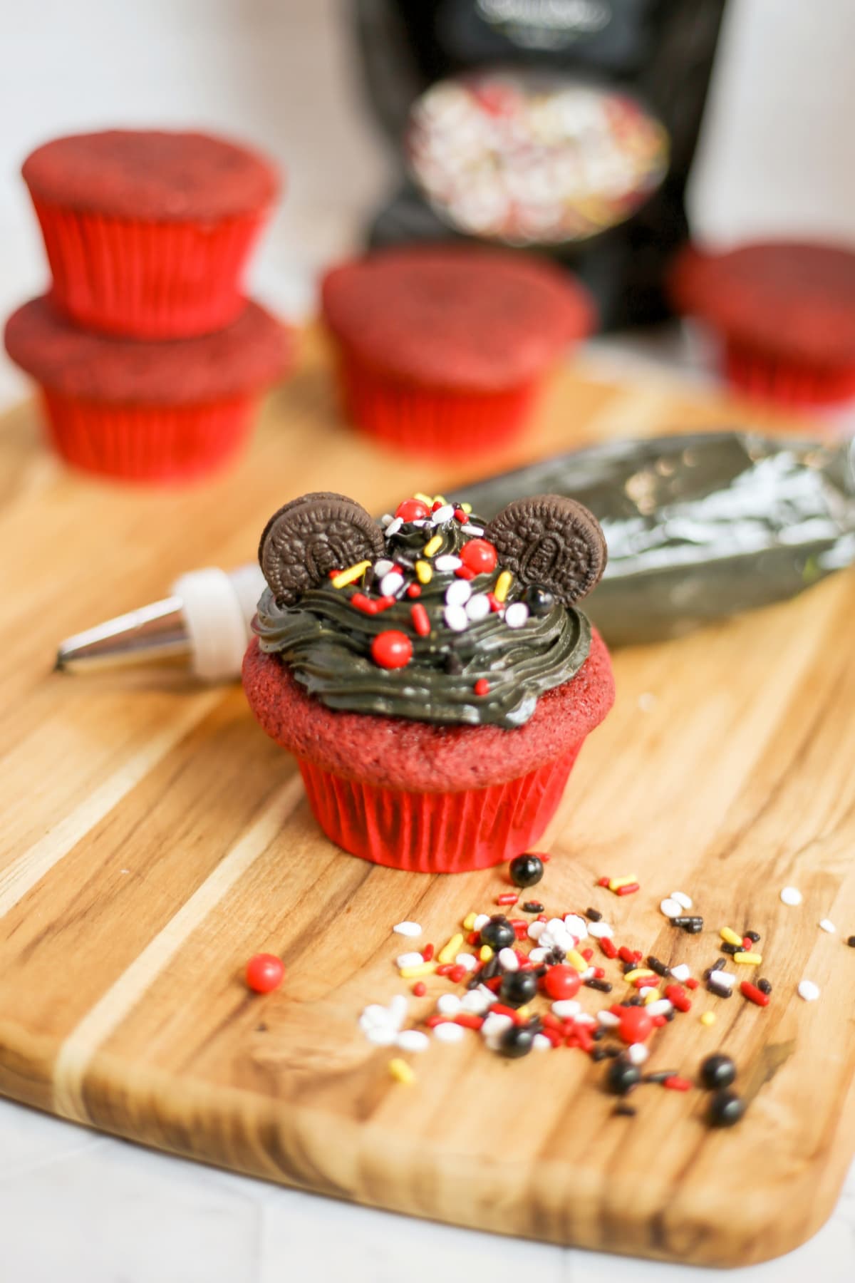 Mickey Mouse cupcake with Oreo ears and sprinkles