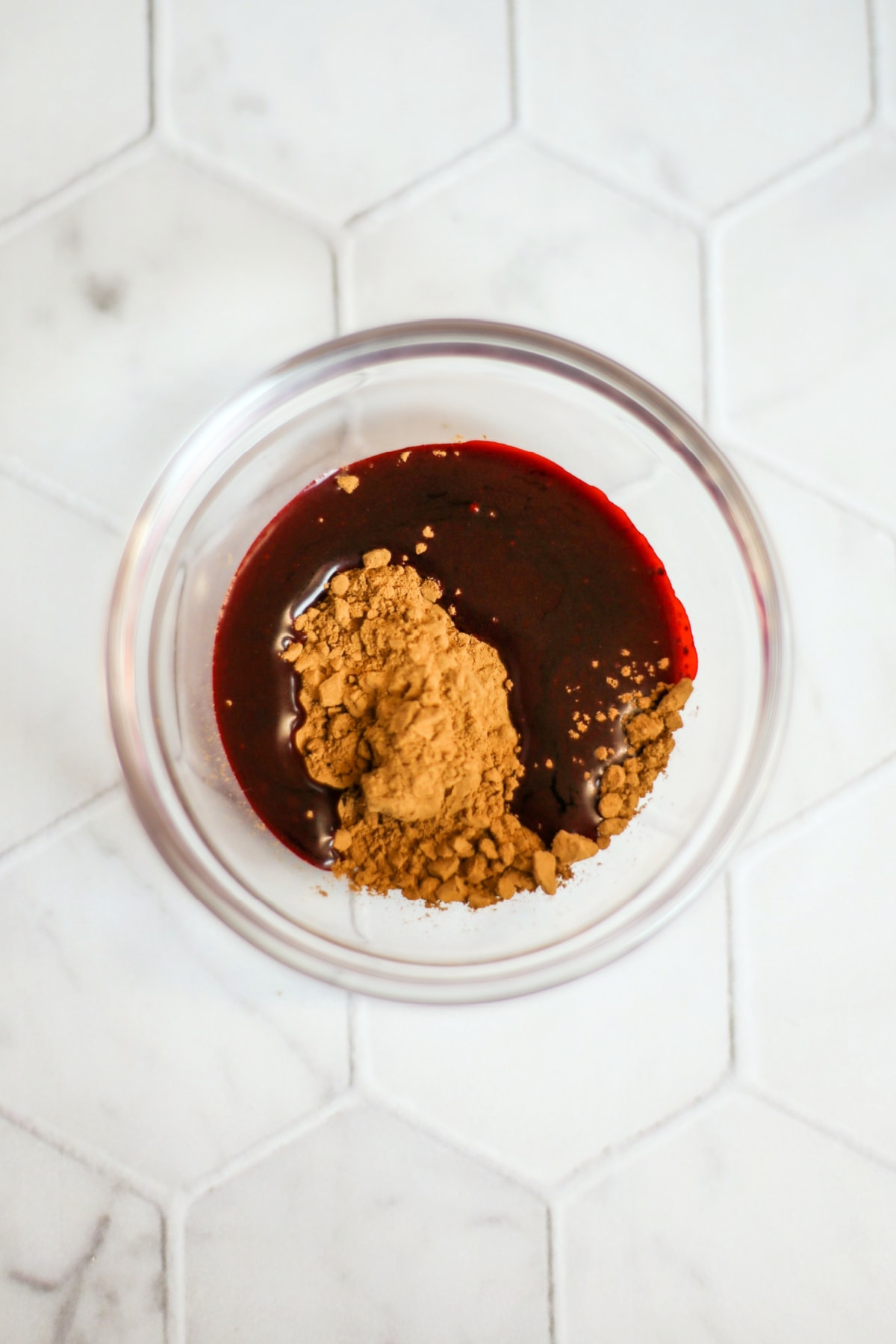 Red food coloring mixed with cocoa powder