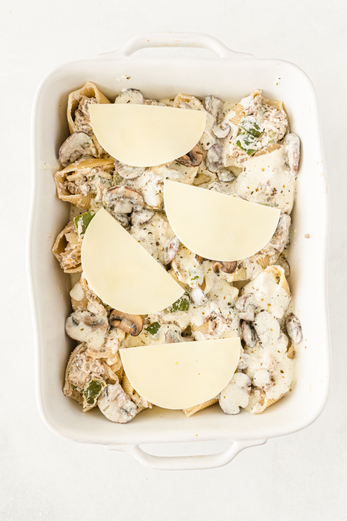 Provolone cheese over stuffed shells