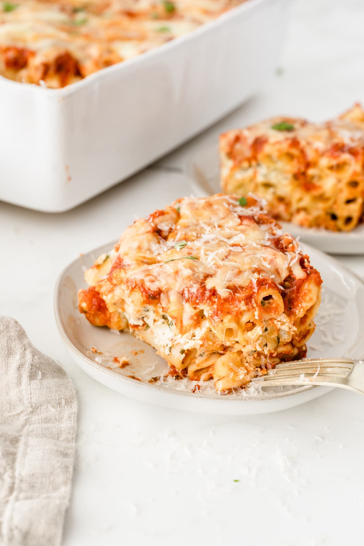 Baked ziti on plate with fork