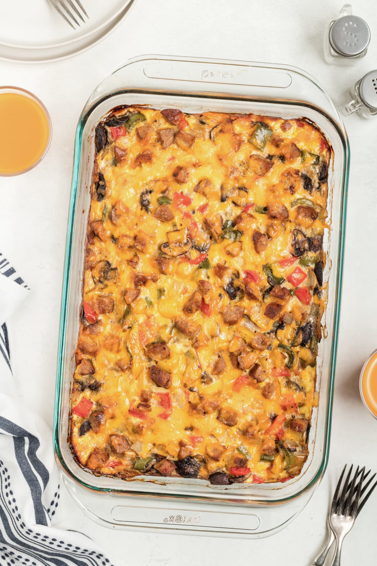 Sausage Egg And Cheese Breakfast Casserole baked in glass pan