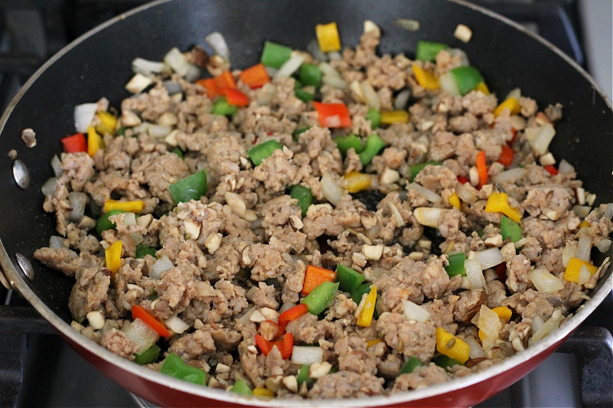 Vegetables and ground sausage in pan