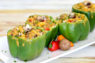 Sausage Stuffed Peppers on long white plate