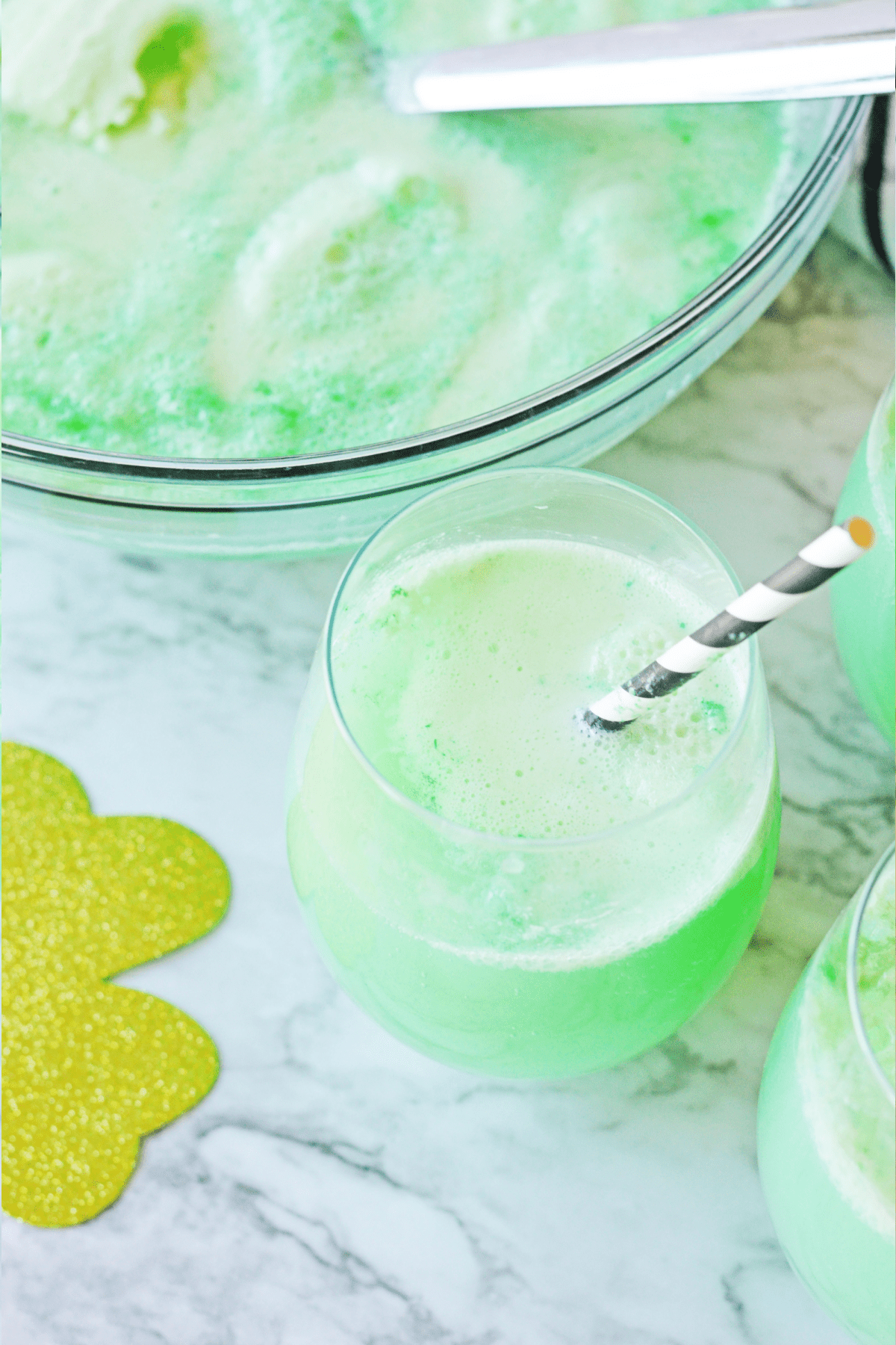 Lime sherbet punch with striped straw