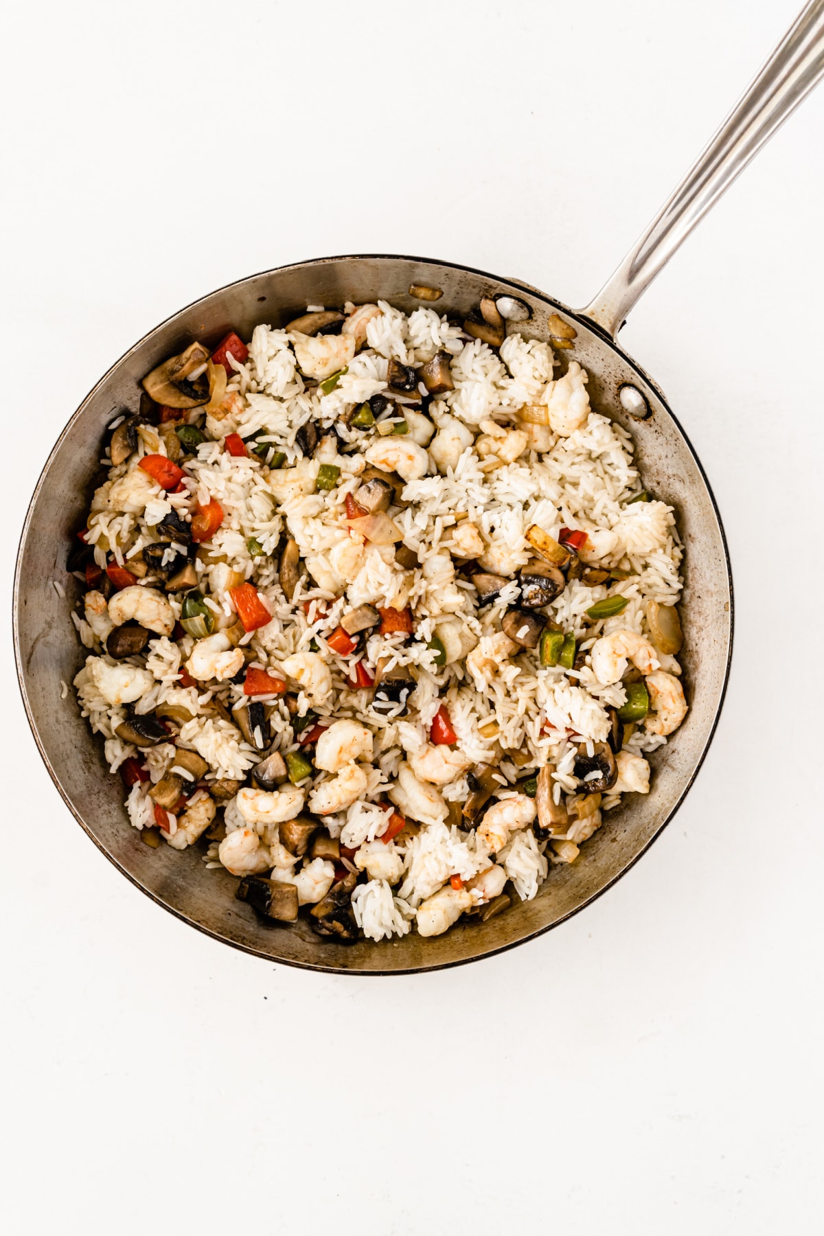 Shrimp, veggies and rice in pan