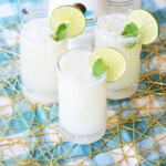 Three coconut mojitos with lime