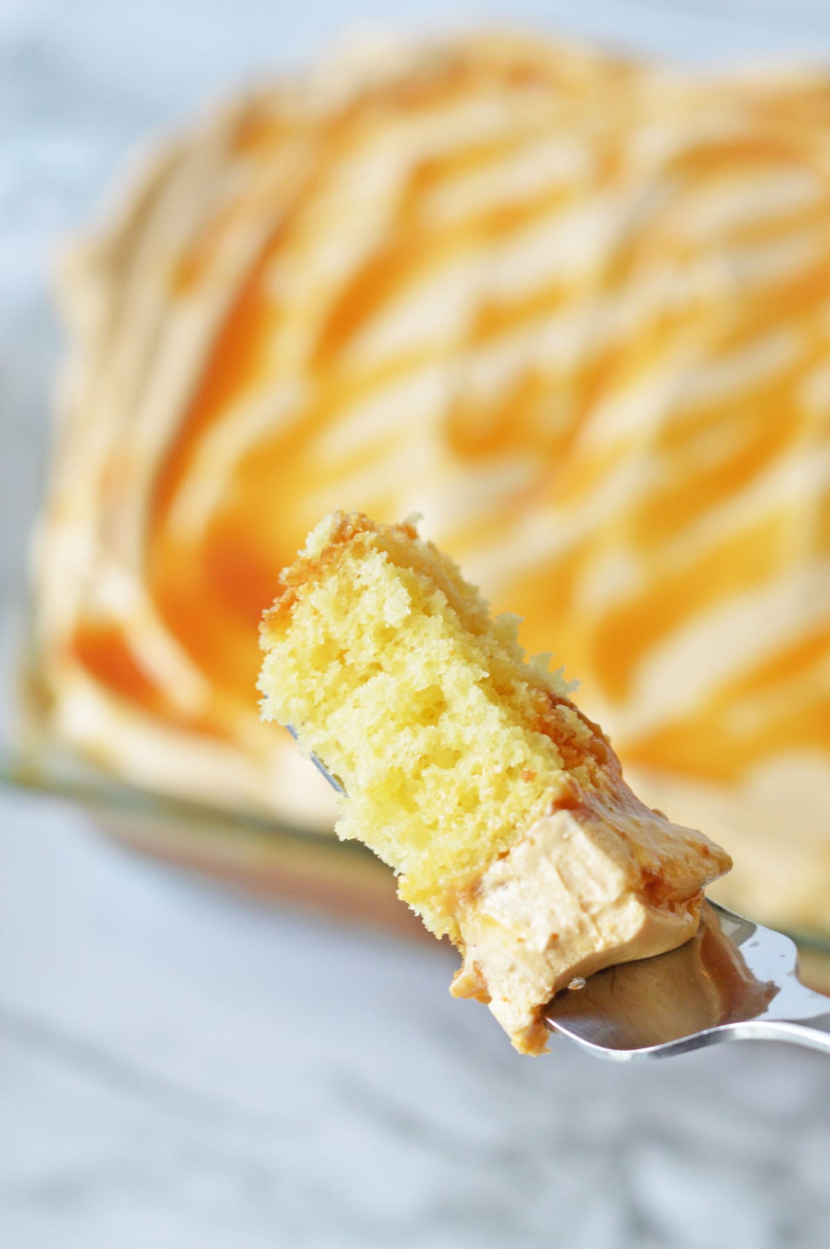 Butterbeer poke cake on fork