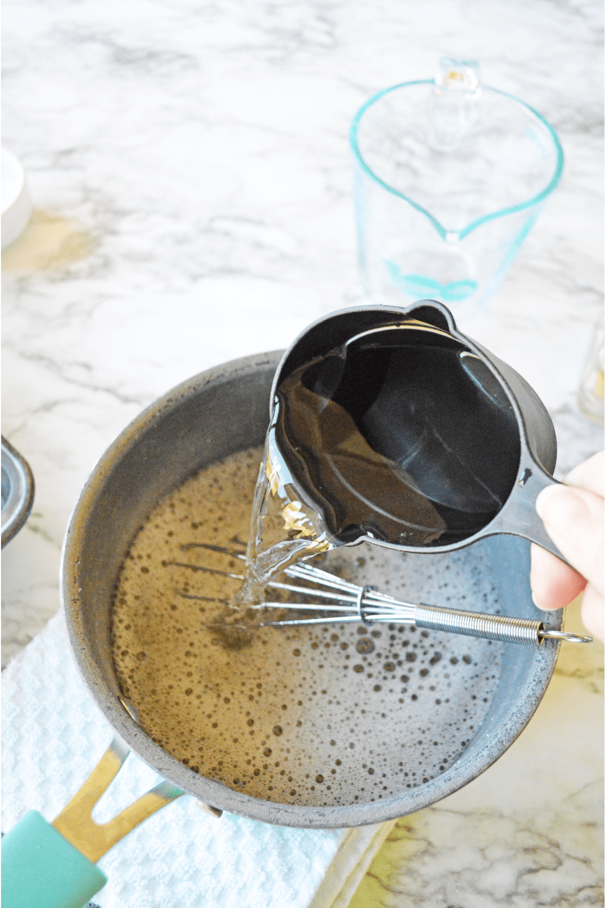 Adding tequila to sauce pan for margarita jello shots