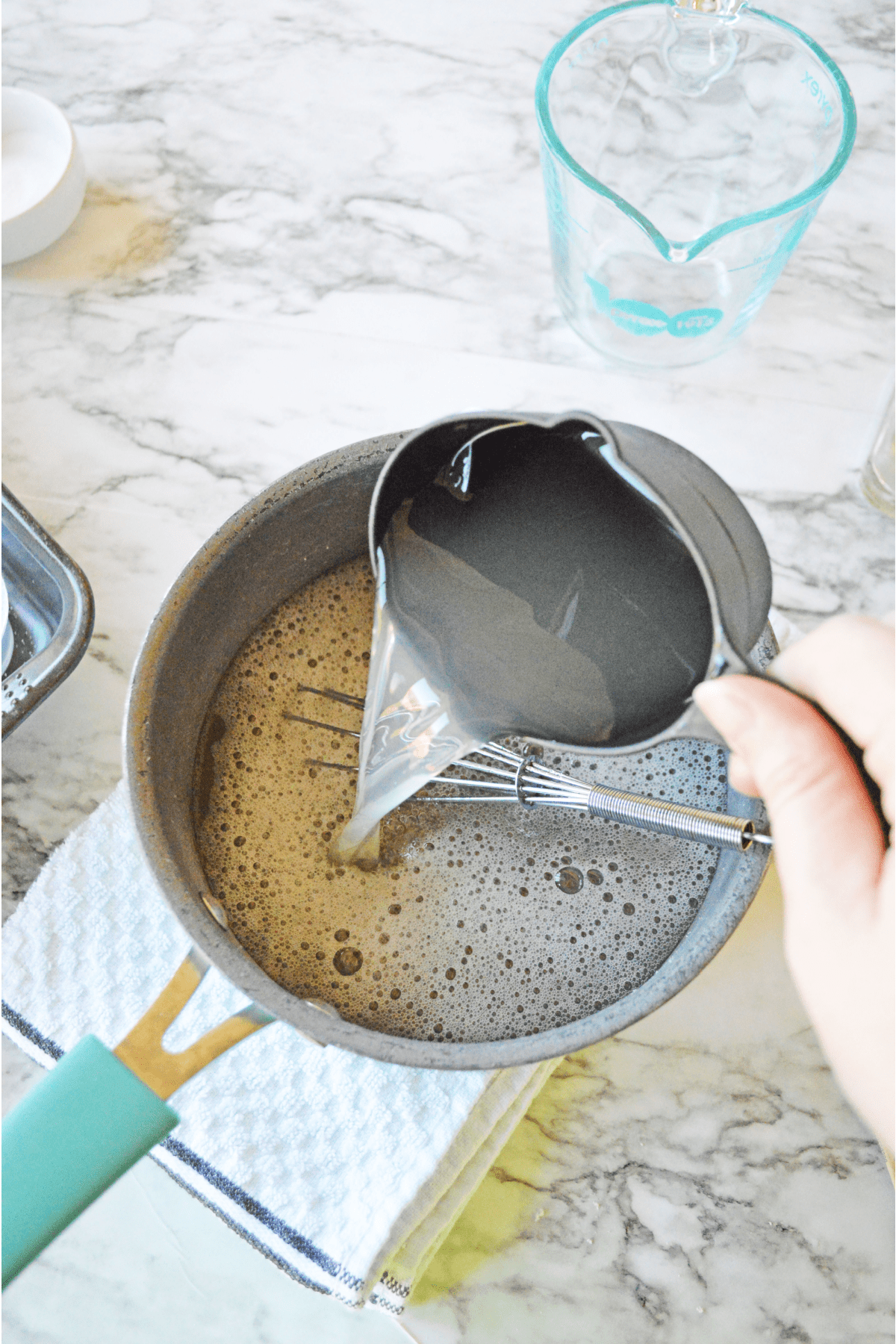 Adding margarita mix to sauce pan for jello shots