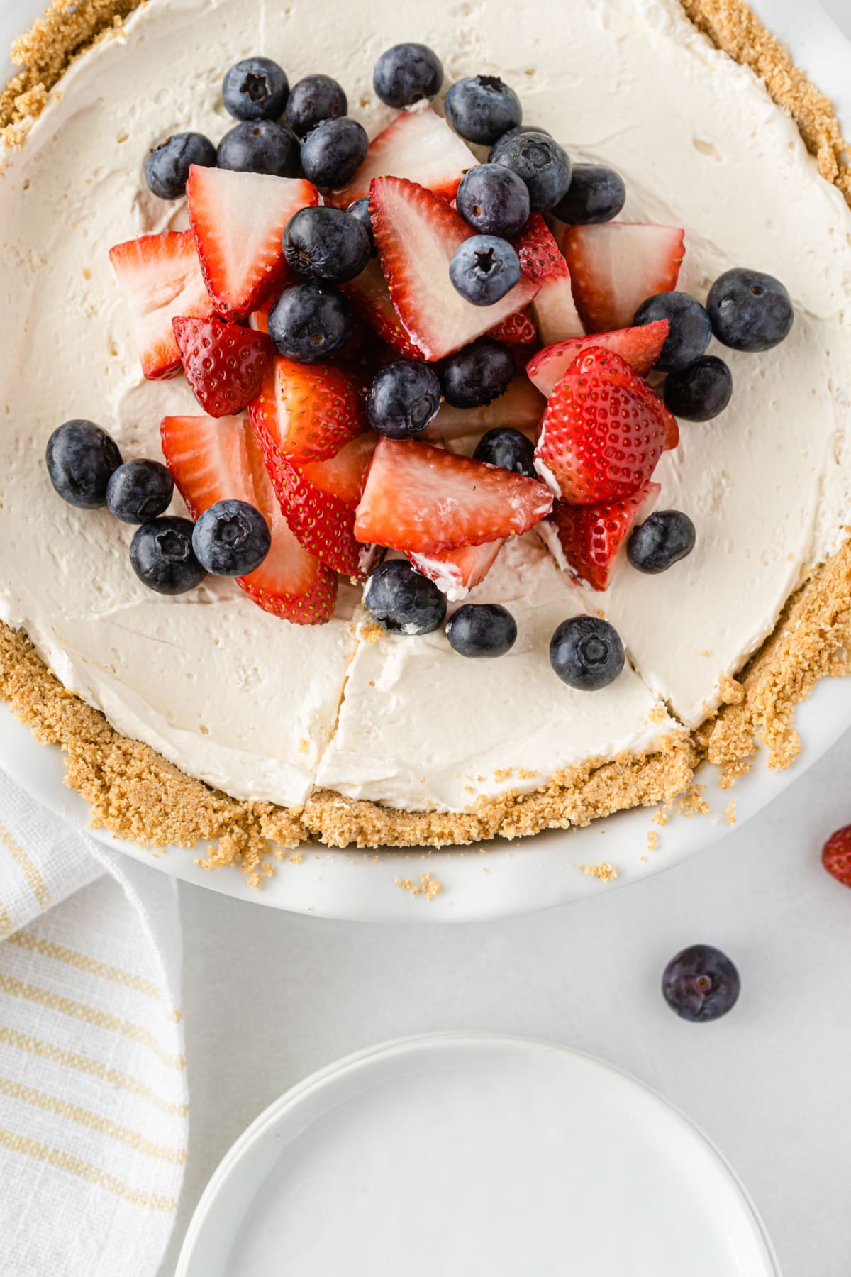 No bake cool whip cheesecake with strawberries and blueberries