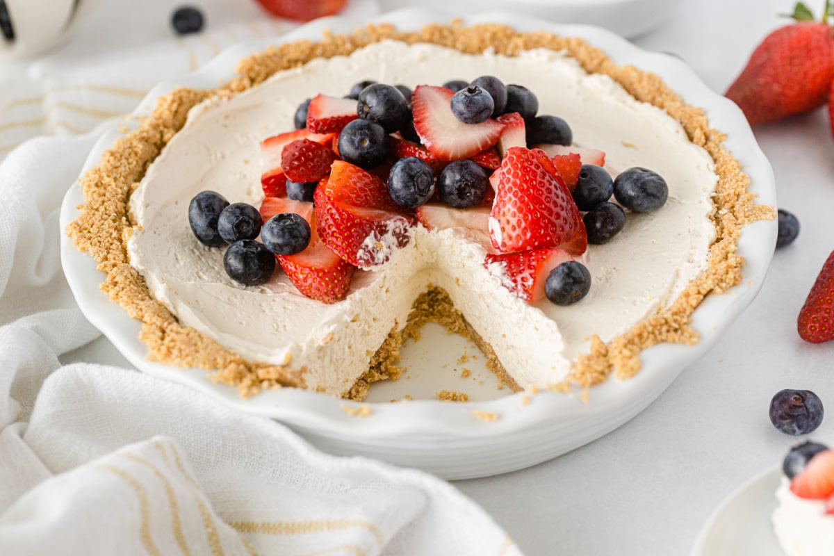 No bake cheesecake with a piece cut out