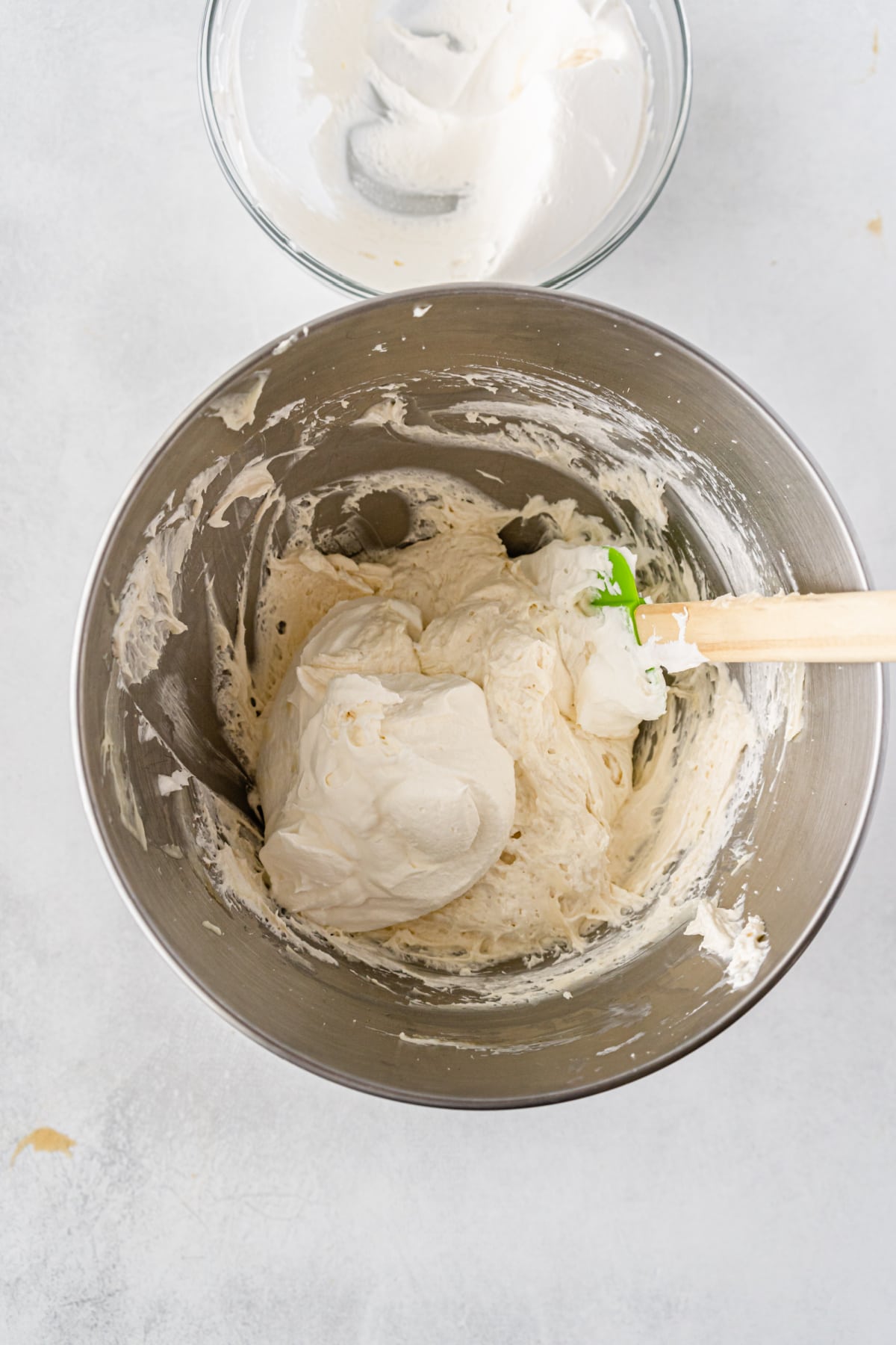 Folding cool whip into cream cheese mixture