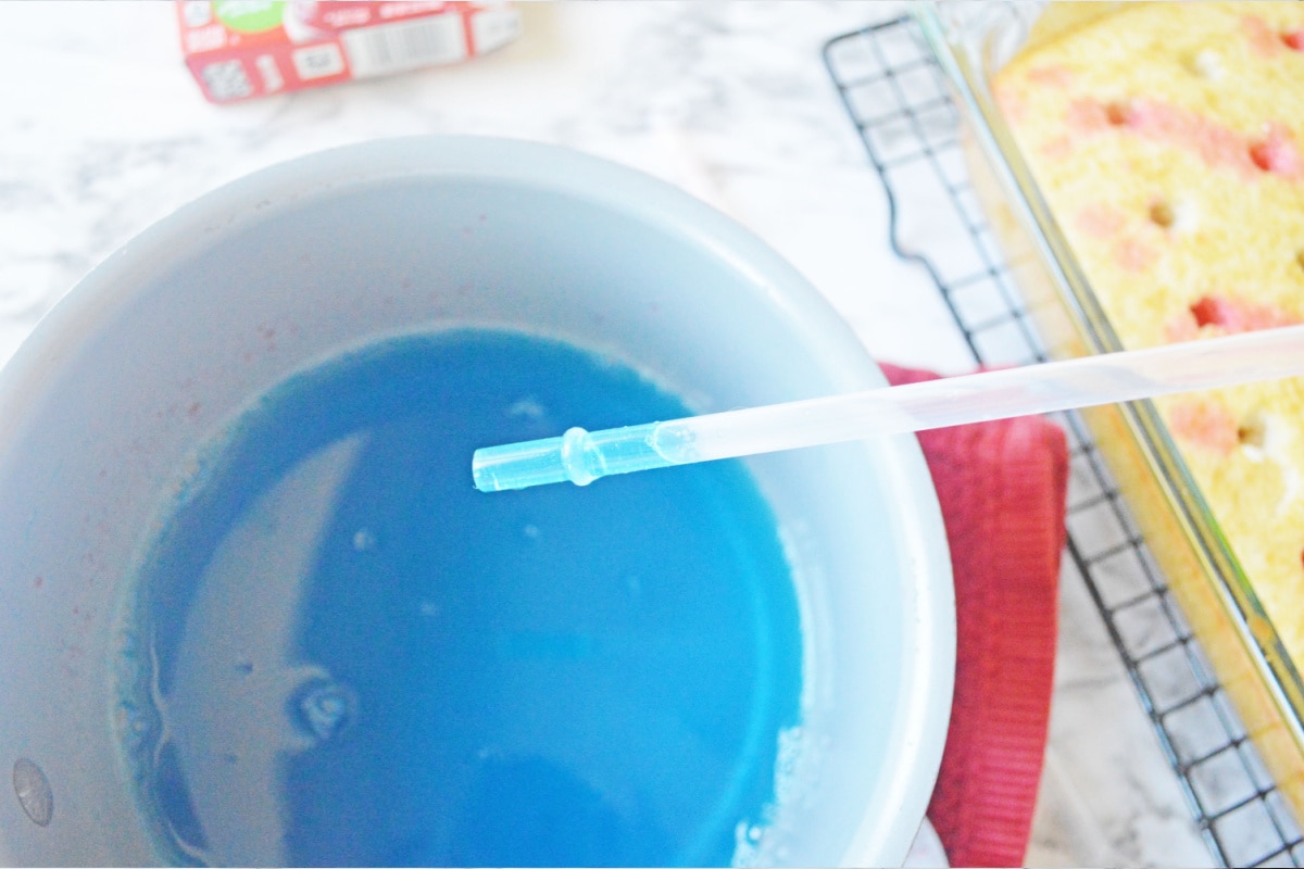 Blue jello in straw
