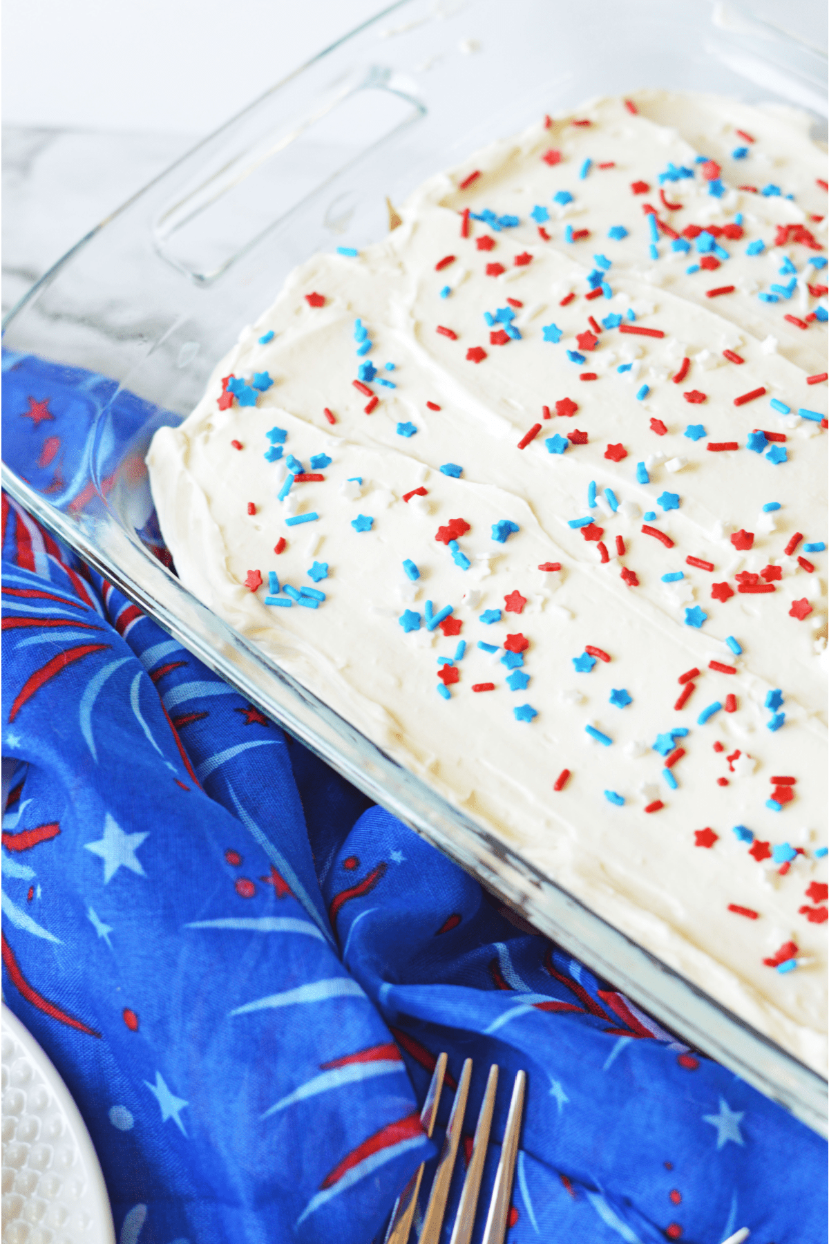 Red White And Blue Poke Cake in glass baking pan