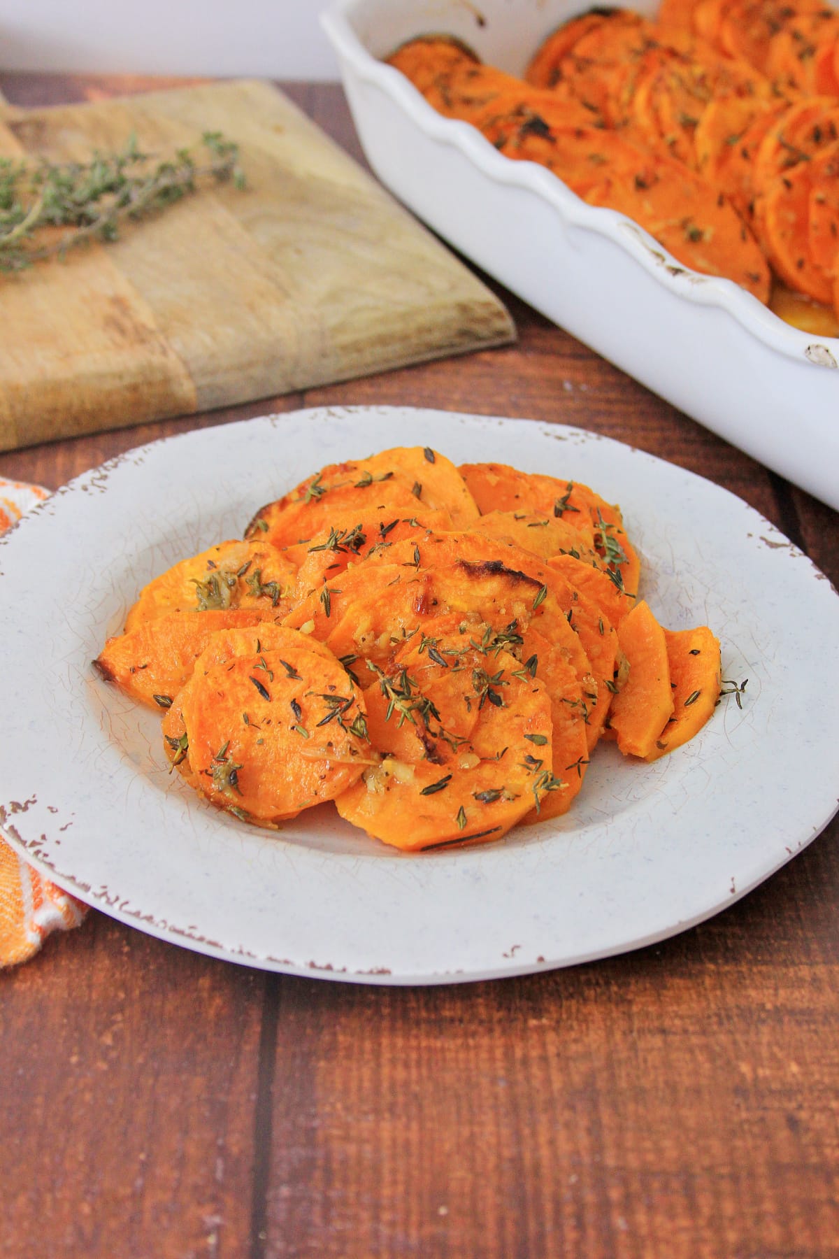 Roasted sweet potato slices in white dish