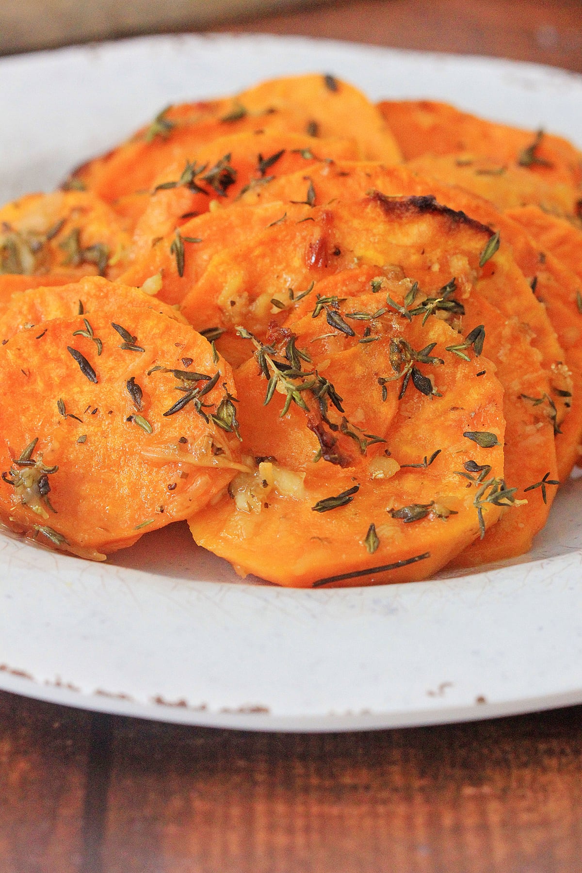 Roasted sweet potato slices in white dish
