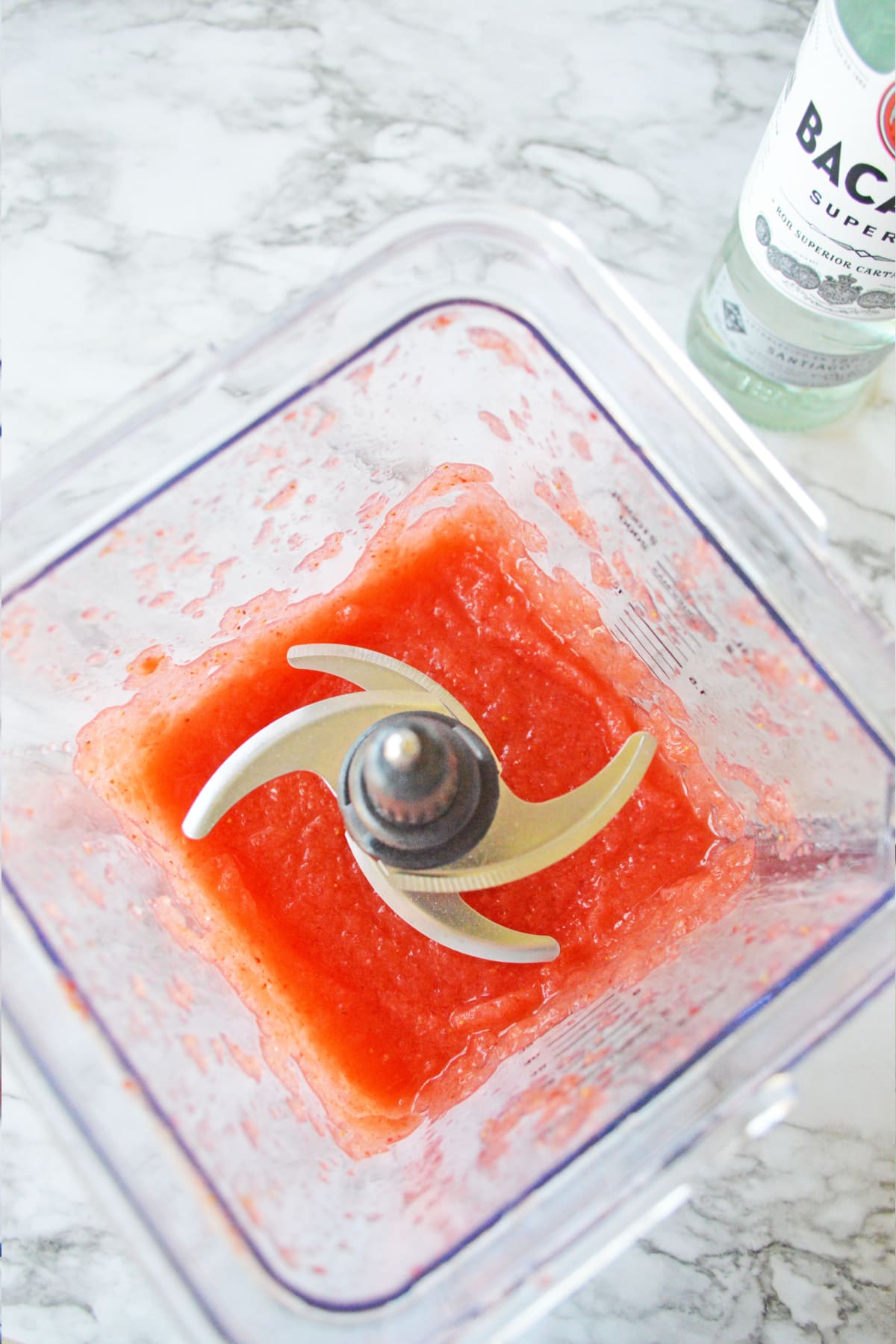 Frozen strawberry daiquiri in blender