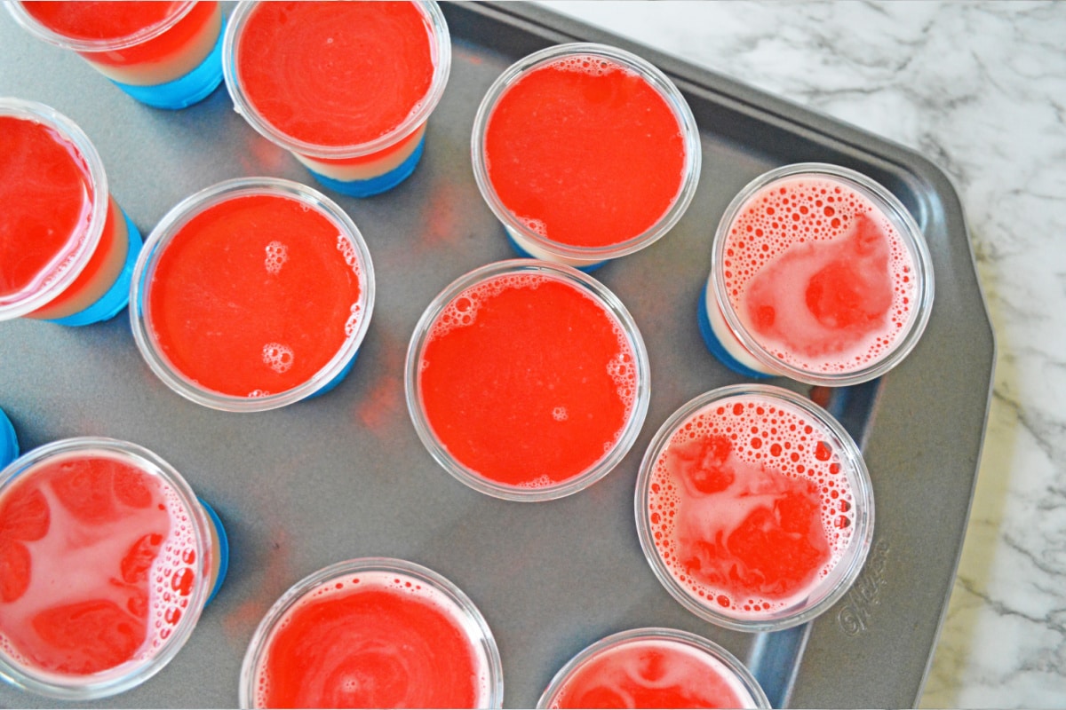 Red white and blue jello shots on baking tray