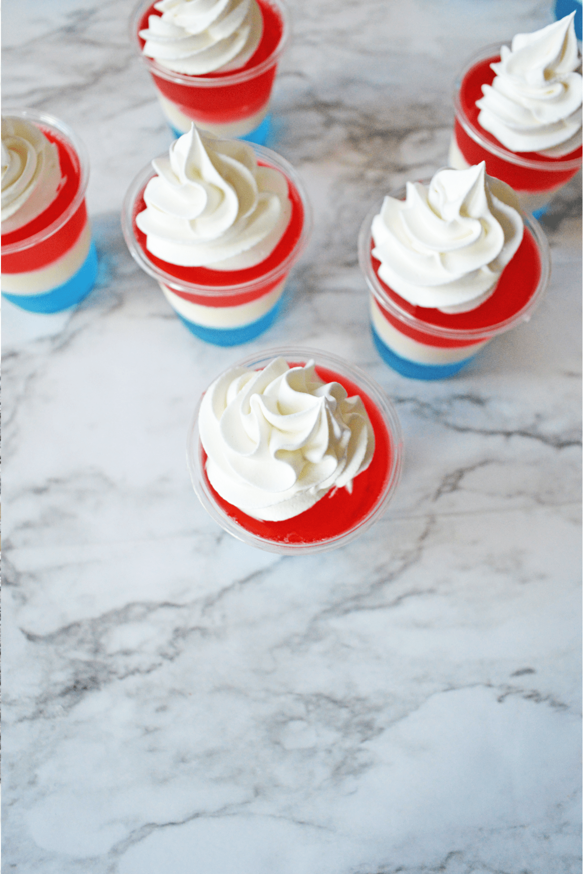 Jello shots topped with whipped cream