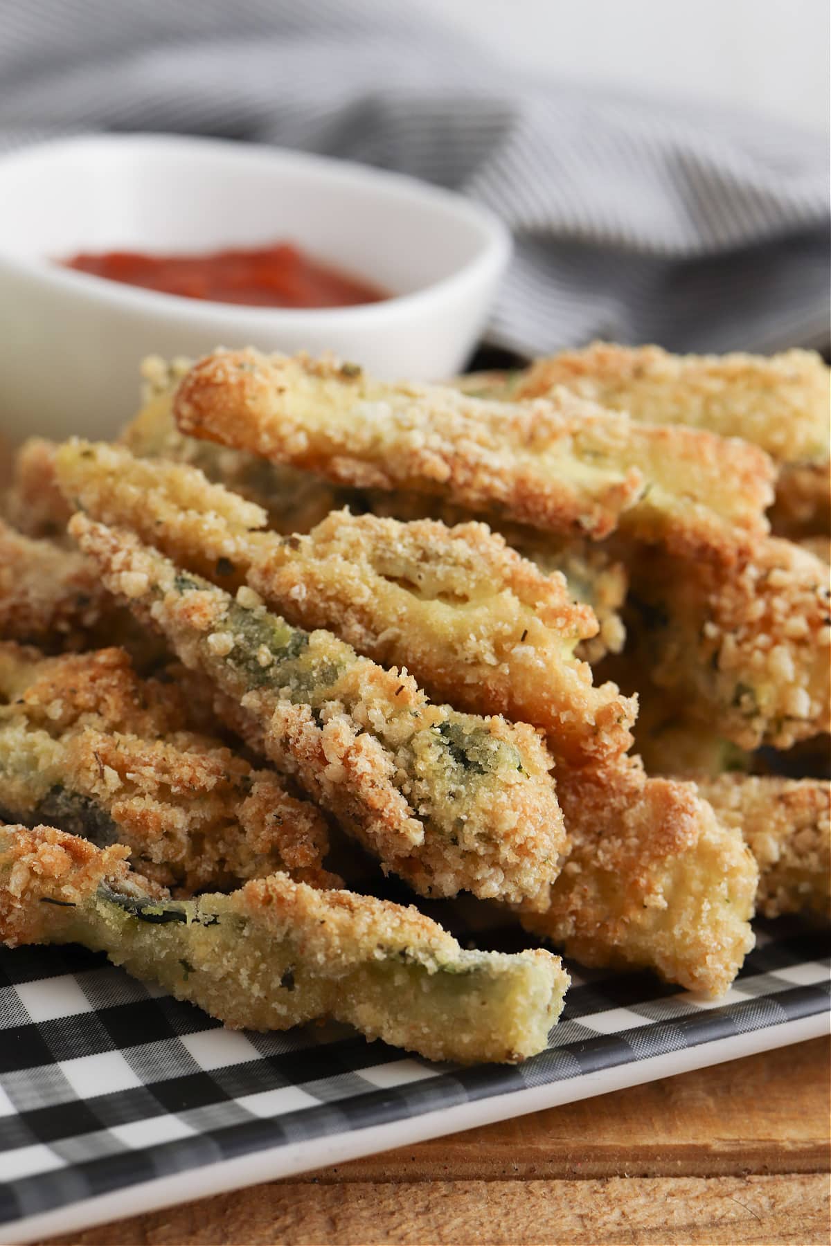 Crispy baked zucchini fries on plate