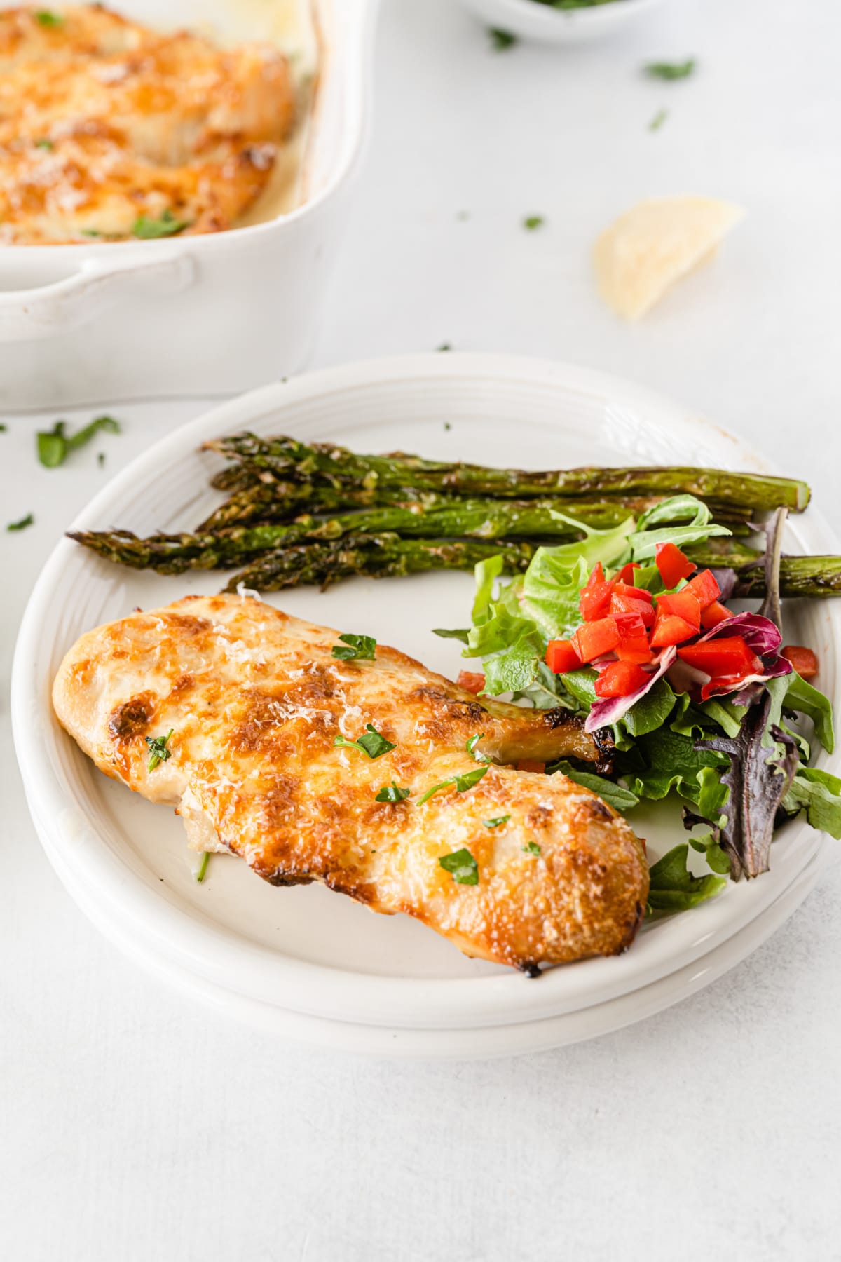 Parmesan Crusted Chicken on plate with veggies