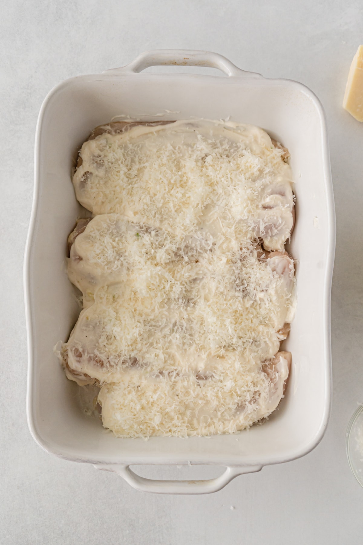 Parmesan Crusted Chicken With Mayo in baking pan