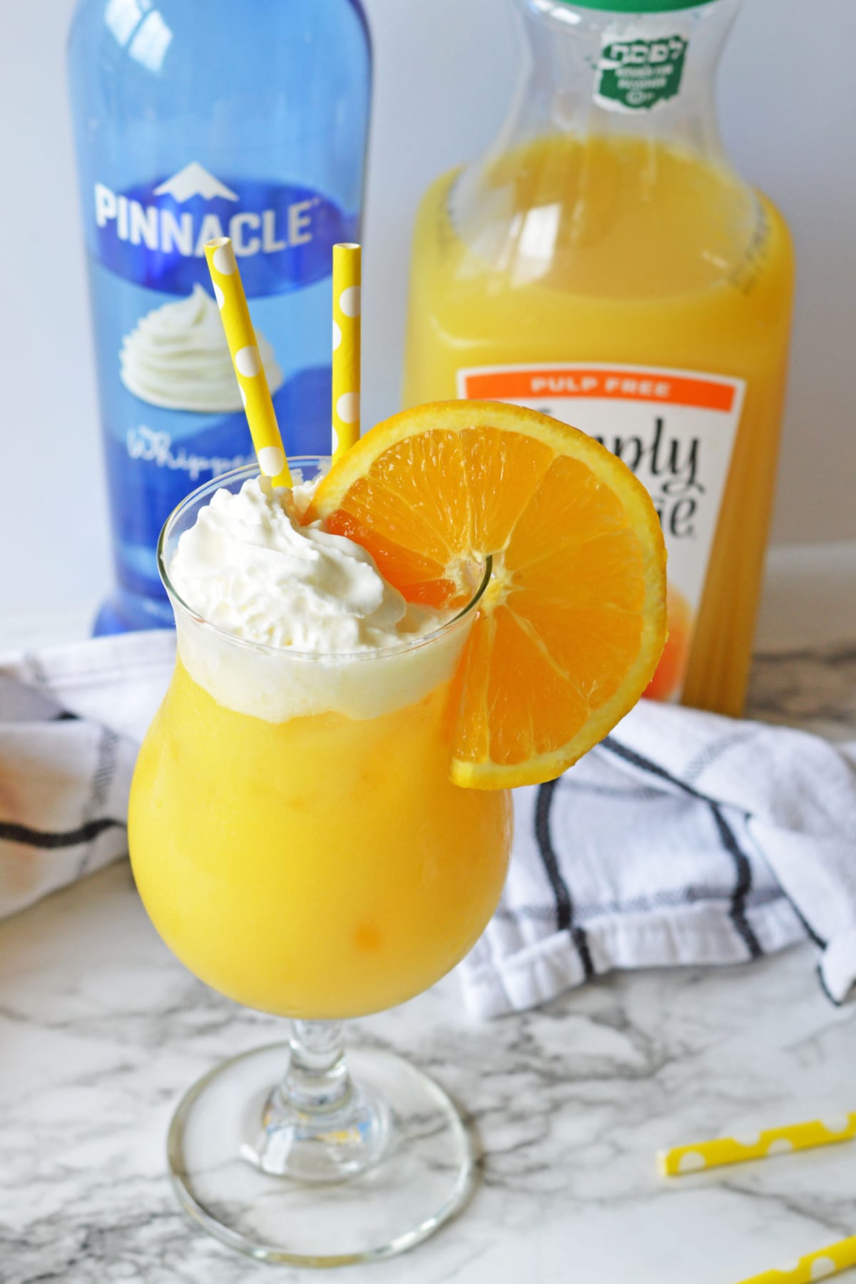 Orange creamsicle cocktail with orange juice and vodka